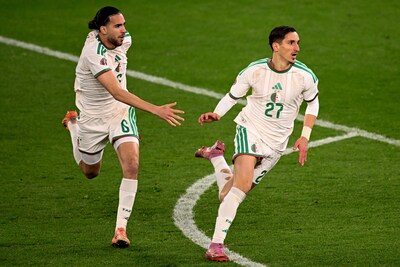 https://images.pzc.nl/Yjg2NjE5OGVlOWE1Yjg1M2EwMTIvZGlvLzI2ODMxODEwNy9maXQtd2lkdGgvNDAw/algeria-s-midfielder-6-ramiz-zerrouki-and-algeria-s-forward-27-adil-boulbina-celebrate-after-the-africa-cup-of-nations-can-round-of-16-football-match-between-algeria-and-democratic-republic-of-congo-at-the-prince-moulay-el-hassan-stadium-in-rabat-on-january-6-2026-photo-by-sebastien-bozon-afp